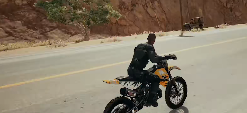 绝地求生怎么骑车开枪